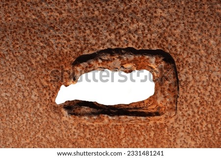 Hole in the Rusty Metal pipe. closeup image.  background of Old steel tank is holes from rust close up. empty frame. isolated on white background. 