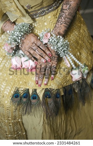Wedding Ceremony. Bride Hands And Ring And Banlge Photos.