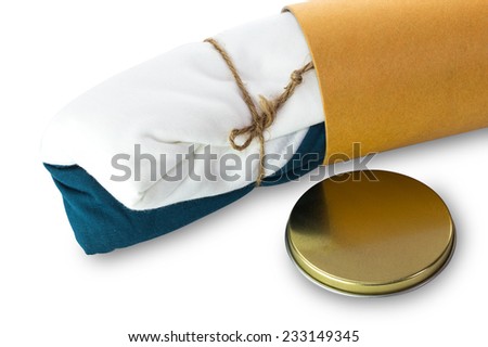 Open brown cylinder tube container and T-shirt isolated on white background with work path