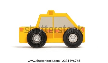 Retro wooden toy car isolated on a white background