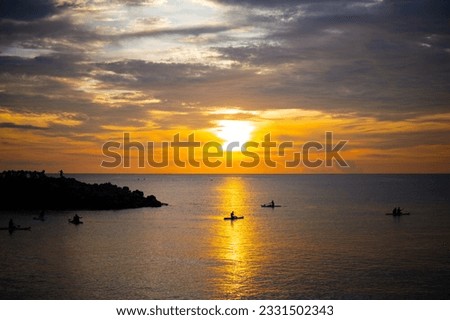 Beautiful sunset with boats silluete
