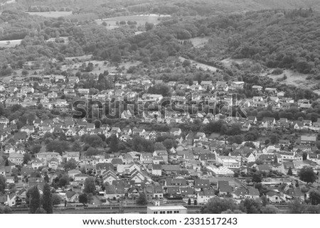 black and white photography of a city from above many houses
