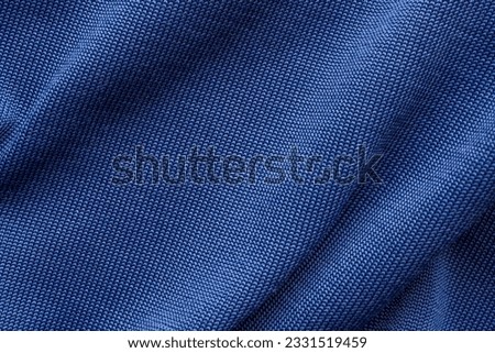 Blue sports clothing fabric football shirt jersey texture Royalty-Free Stock Photo #2331519459