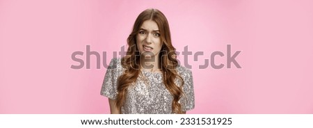 Close-up shot displeased frustrated upset awkward attractive glamour woman freaked-out cringing grimacing aversion disapporval dislike, being upset shocked, standing disappointed pink background.