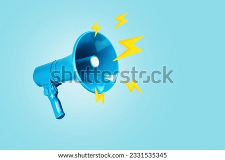 Creative blue loudspeaker with yellow lightning bolts on a blue background. Creative idea, attention! Urgent news. Lightning traffic, advertising and message. Royalty-Free Stock Photo #2331535345