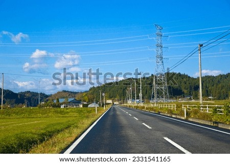 Tohoku drive trip : Lanscape of Yamagata countryside with mountains road and rice paddies, Yamagata, Tohoku, Japan. Royalty-Free Stock Photo #2331541165
