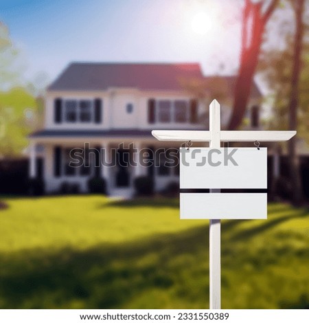 Blank Real Estate Sign in front of new house