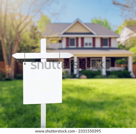 Blank Real Estate Sign in front of new house
