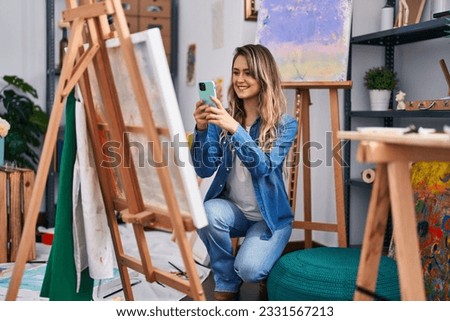 Young woman artist make photo to draw at art studio