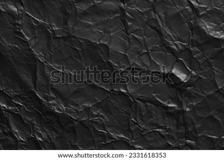 black crumpled paper texture background ,parchment paper copy space as contemporary backdrop for display or montage your text or products.