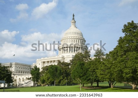 The US Capitol building in Washington DC gleams in the afternoon sun  Royalty-Free Stock Photo #2331643963