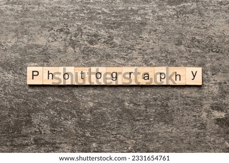 photography word written on wood block. photography text on table, concept.