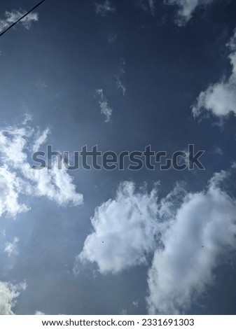 white clouds on a blue sky during the day