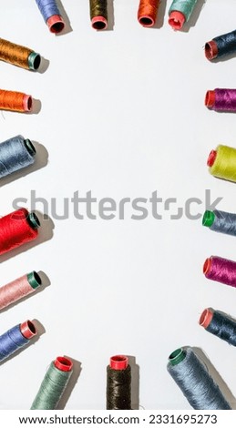 circle colorful sewing thread on white background. design for greetings. 