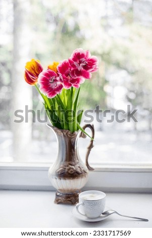 Vase full of Tulips isolated on white background. High quality photo