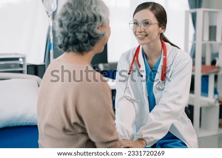 Female doctors shake hands with patients encouraging each other  To offer love, concern, and encouragement while checking the patient's health. Concept Health care and Social Security