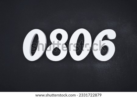Black for the background. The number 0806 is made of white painted wood.