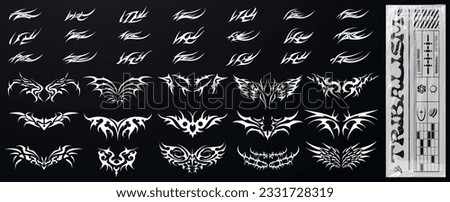 Set of elements in the neotribal style, combining various symbols and motifs. Succubus Y2K womb tattoo. Demon heart sigil and butterfly with in neo tribal style isolated on a black background. Royalty-Free Stock Photo #2331728319
