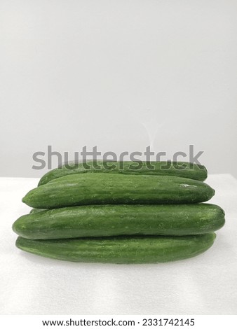 FRESH CUCUMBER HEALTHY AND DELICIOUS RAW PHOTO