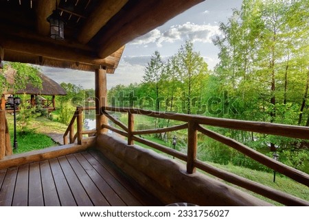 Wooden house with terrace in the forest