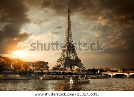 Eiffel Tower and bridge Iena on the river Seine in Paris, France.