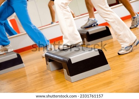 health club- group of people doing aerobics