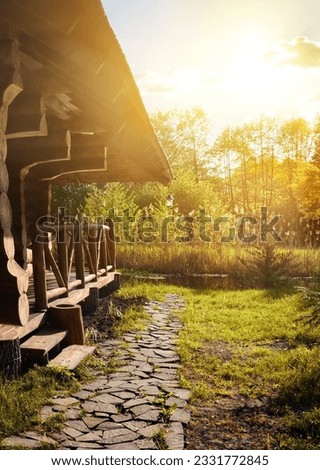 Wooden house at dawn in the park