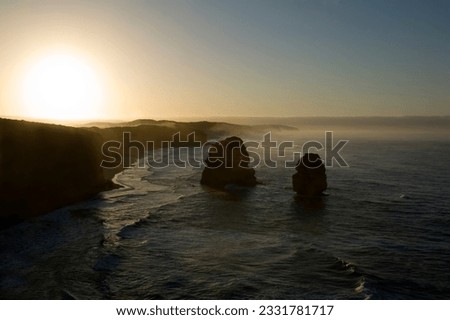 Australia-s natural wonder, The Twelve Apostles - sandstone cliffs worn away by erosion. Taken at sunrise. Royalty-Free Stock Photo #2331781717