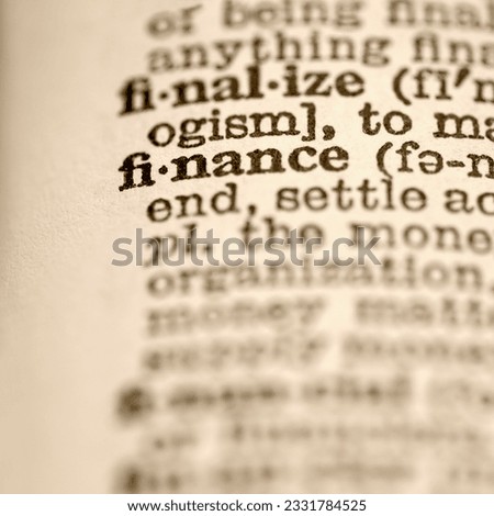 Selective focus of dictionary entry for the word finance.