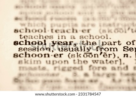 Selective focus of dictionary definition for school year.