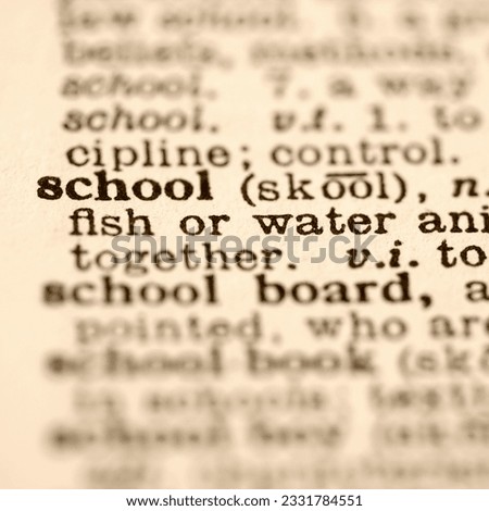 Selective focus of dictionary definition for the word school.