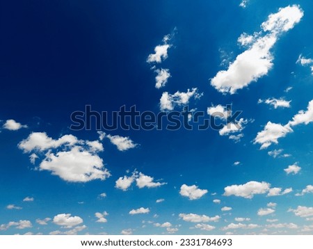 Cumulus cloud formation in blue sky.