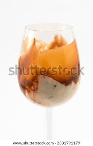 ice cream in a tall glass, shot on white, closeup