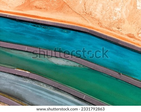 Aerial detail of tailing ponds for mineral waste in rural Utah, United States.