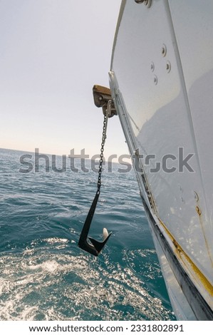 Boat pulling up anchor off Anacapa Island, CA