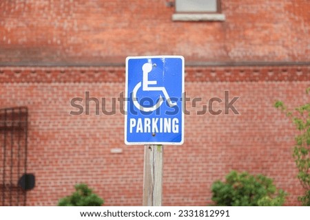 blue wheelchair symbol on a white background. The handicap sign represents accessibility, inclusivity, and equal rights for individuals with disabilities