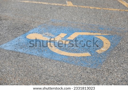 blue wheelchair symbol on a white background. The handicap sign represents accessibility, inclusivity, and equal rights for individuals with disabilities