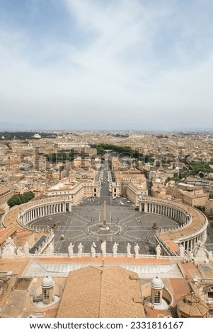 High angle view of St Peter-s Square with skyline of Vatican City in the background. Vertical shot.