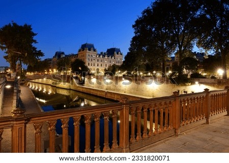 View on Promenade Maurice Careme from Pont au Double near Notre Dame de Paris, France
