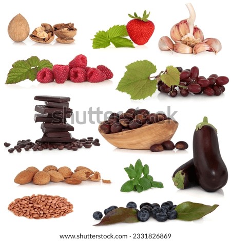 Healthy food collection very high in antioxidants and vitamins, isolated over white background.