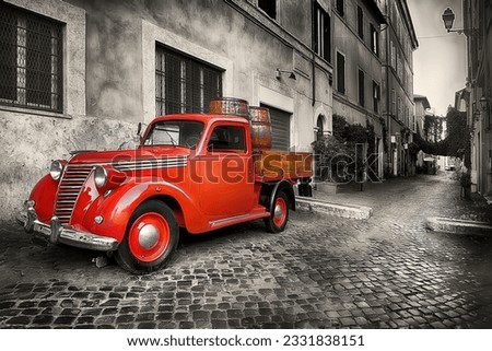 Red retro car on the street of Trastevere in Rome, Italy