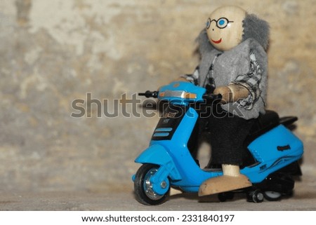 Delivery service cartoon riding bike toy.