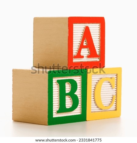 ABC alphabet blocks stacked together.