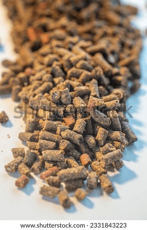 Livestock feed including horse, donkey, mule, goat, pig and chicken feed. Royalty-Free Stock Photo #2331843223