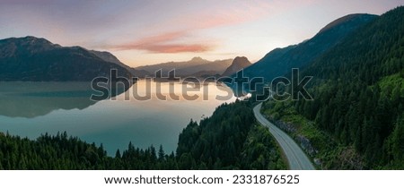 Sea to Sky Highway on Pacific Ocean West Coast. Aerial Panorama. Colorful Sunrise Sky. Located in Howe Sound between Vancouver and Squamish, British Columbia, Canada. Royalty-Free Stock Photo #2331876525