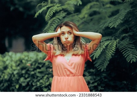 
Stressed Woman Feeling Exasperated at Garden party . Overwhelmed lady thinking of a solution to her problem
 Royalty-Free Stock Photo #2331888543
