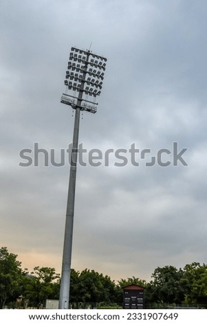 Cricket stadium flood lights poles at Delhi, India, Cricket Stadium Light Royalty-Free Stock Photo #2331907649
