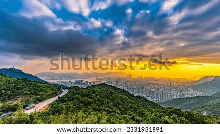 The Landscape of a famous Mountain in Hong Kong at Sunset Royalty-Free Stock Photo #2331931891