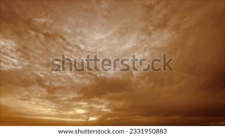 pretty sundown golden clouds on the sky bg - photo of nature
