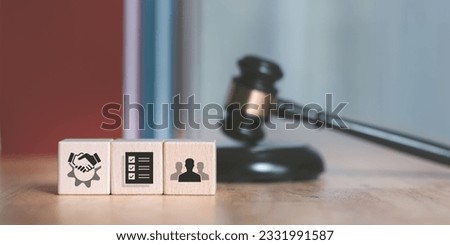 Wooden judge gavel on table ,justice in punishment of offenses and criminal verdicts ,concept of law and justice ,court proceedings ,planning for court proceedings ,legal contract consulting Royalty-Free Stock Photo #2331991587
